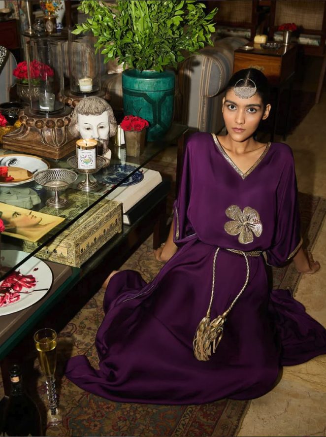 Model in a purple couture ensemble, luxury fashion branding by BHA Future Co